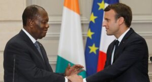 Ivory Coast President Alassane Ouattara and Emmanuel Macron